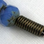 Make coiled crimp bead covers - tutorial by Rena Klingenberg
