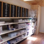 Steel shelves and tray storage for finished jewelry