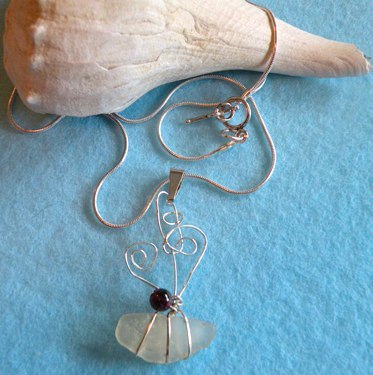 White seaglass (Hawaii) with sterling silver wire detailby Jean of www.luckyseaglass.com