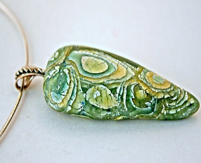 Polymer clay pendant by Marilyn Davenport