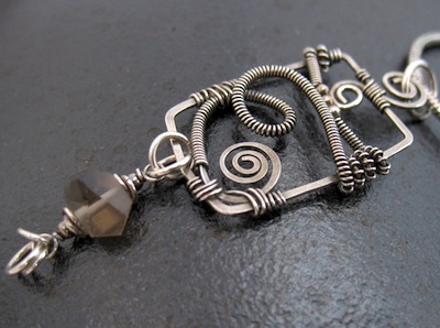 Silver wire-wrapped pendant with smoky quartz by Jane of Lone Rock Jewelry