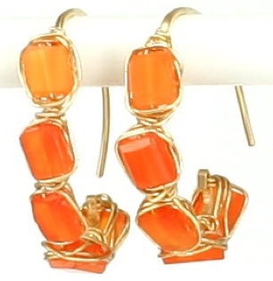 Five stone half-hoops by Judith Bright