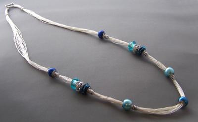 Large holed glass and acrylic beads on silk threads