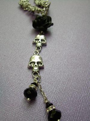 Close upm of rose, skulls & swarovski