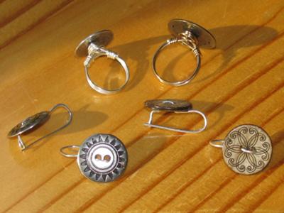 Front and back view of button rings and earrings