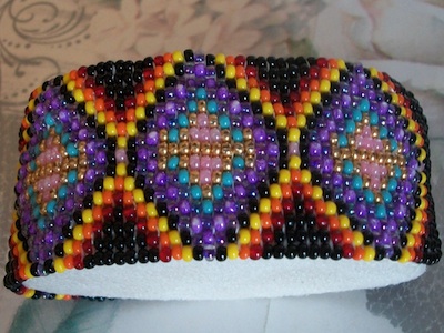 Seed beads in a rainbow of colors