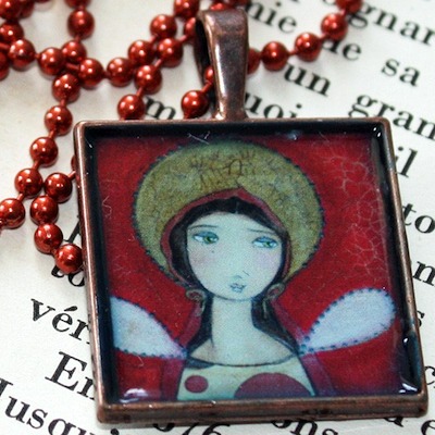 Print from an original painting by Flor Larios, made into a pendant