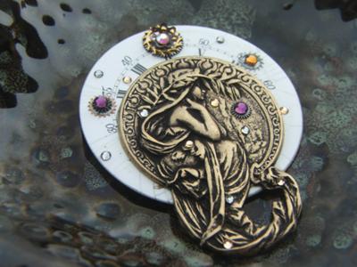 Brass Art Nouveau component, gears, and crystals