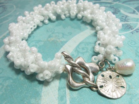 White beaded sand dollar bracelet