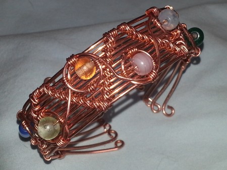 This is one I just finished with multi color glass beads.