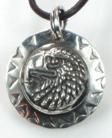 Silver pendant made from Eagle button with added silver decoration