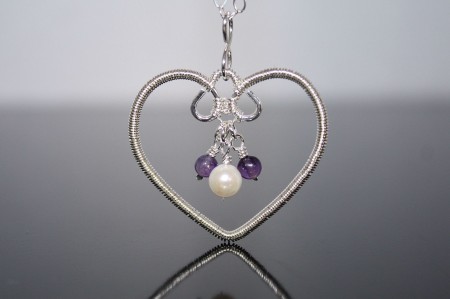 My sterling silver heart with Amethyst and Pearls