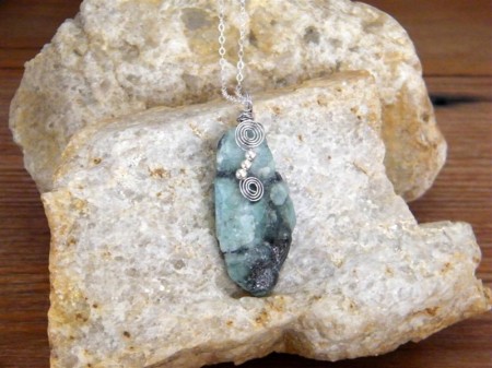 Raw Emerald Necklace on Quartz Rock