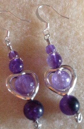 These are wire wrapped earrings. I made the headpins with knotted ends.