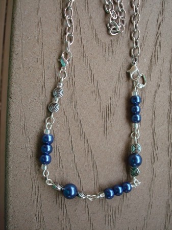 This is a blue and silver bracelet, added a chain, and its either a bracelet or necklace.