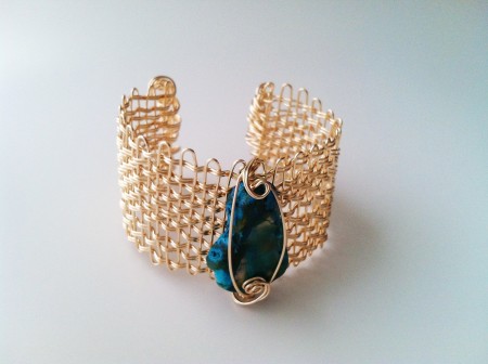Woven cuff with blue agate made from one piece of wire, folding and weaving.