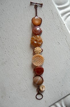 Vintage glass buttons wired on an old bracelet 