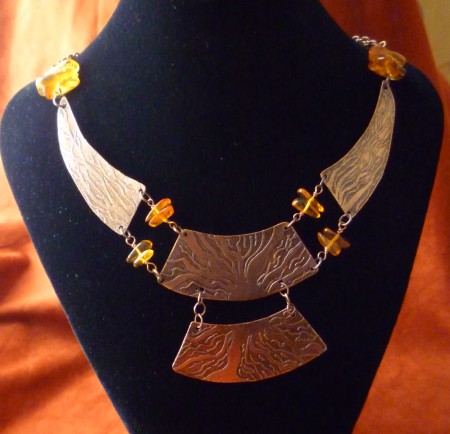 Vintage amber and etched copper necklace.