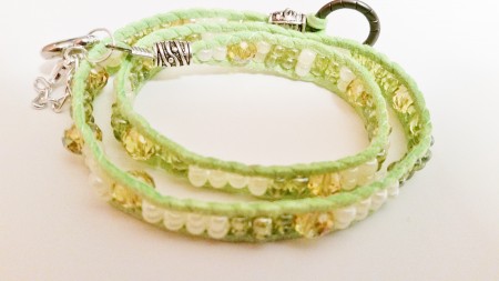 Wrap around braclet made with various shades of green glass beads 