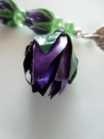 My rosebud pendant in 34 gauge sterling sheet, cut, patinaed, and assembled to mimic.