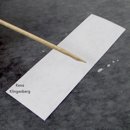 Spreading glue with a toothpick - Wire Line Art Pendant - Tutorial by Rena Klingenberg