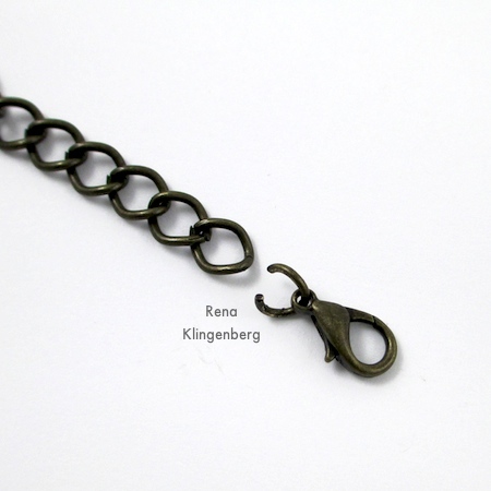 Attach clasp to one end of chain - Stacked Rings Necklace - Tutorial by Rena Klingenberg
