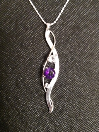 Natural Amethyst and Lab Created White Sapphire on sterling.
