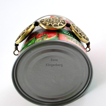 Shaping beaded wire around the mandrel for Beads and Chains Bracelet - Tutorial by Rena Klingenberg