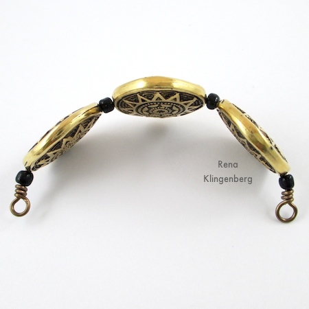 After shaping beaded wire around the mandrel for Beads and Chains Bracelet - Tutorial by Rena Klingenberg