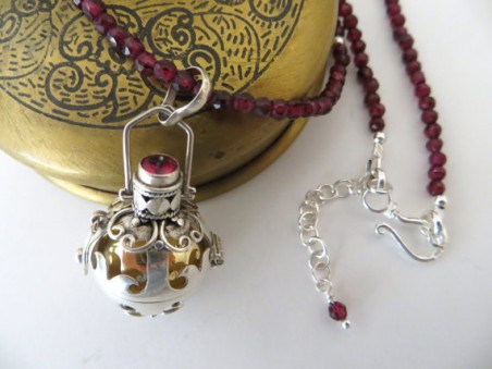 Garnet Gemstone Necklace With Balinese Chime Ball Pendant by Holly Louen - featured on Jewelry Making Journal