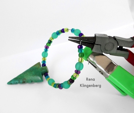 Making a loop on each wire end - Memory Wire Pendant and Earrings - Tutorial by Rena Klingenberg