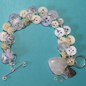 Button jewelry by Johanna Anderson - featured on Jewelry Making Journal