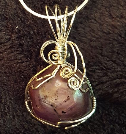 Beautiful Mauve Star Sapphire Wire Wrapped in Sterling Silver by RebeccaJane Morgan  - featured on Jewelry Making Journal