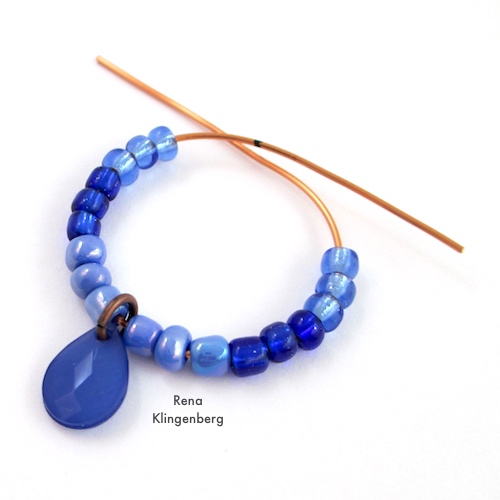 Colorful Hoop Earrings Tutorial by Rena Klingenberg - adding the beads